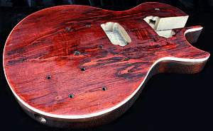 Click image for larger version. 

Name:	red guitar.jpg 
Views:	1075 
Size:	144.8 KB 
ID:	13801