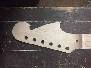Click image for larger version. 

Name:	130117 headstock final shape.jpg 
Views:	149 
Size:	80.2 KB 
ID:	16374