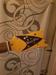 Click image for larger version. 

Name:	Headstock sticker1.jpg 
Views:	168 
Size:	55.7 KB 
ID:	18430
