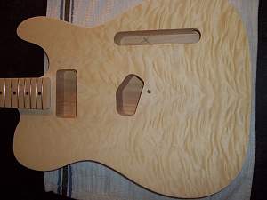 Click image for larger version. 

Name:	guitar front close.jpg 
Views:	289 
Size:	536.6 KB 
ID:	18485