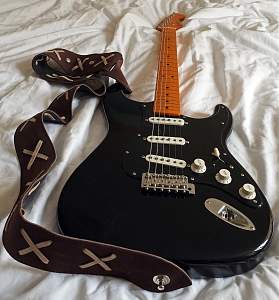 Click image for larger version. 

Name:	Black Strat.jpg 
Views:	444 
Size:	722.2 KB 
ID:	21124