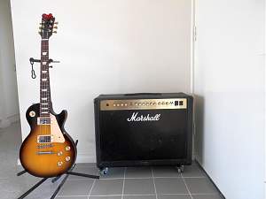 Click image for larger version. 

Name:	Les Paul Studio And Marshall_resized.jpg 
Views:	147 
Size:	179.6 KB 
ID:	24547