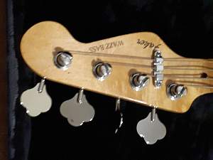 Click image for larger version. 

Name:	J Bass Headstock close up.jpg 
Views:	323 
Size:	173.8 KB 
ID:	28530