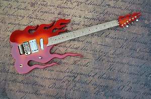 Click image for larger version. 

Name:	Flame Guitar.jpg 
Views:	478 
Size:	109.7 KB 
ID:	29120