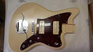Click image for larger version. 

Name:	16_Body_with_wiring_and_pickguard.jpg 
Views:	1250 
Size:	287.4 KB 
ID:	29577