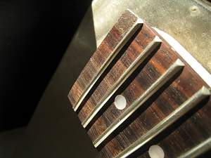 Click image for larger version. 

Name:	Fretboard scratches2.jpg 
Views:	247 
Size:	280.9 KB 
ID:	29978