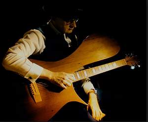 Click image for larger version. 

Name:	flacco guitar.jpg 
Views:	295 
Size:	61.8 KB 
ID:	31123