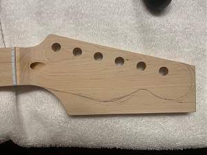 Click image for larger version. 

Name:	3. Headstock Shape.jpg 
Views:	219 
Size:	85.6 KB 
ID:	34783