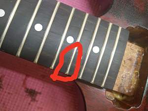 Click image for larger version. 

Name:	fret damage.jpg 
Views:	220 
Size:	107.1 KB 
ID:	37281
