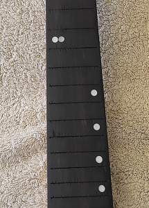 Click image for larger version. 

Name:	fretboard 1.jpg 
Views:	532 
Size:	472.4 KB 
ID:	38921