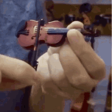 Name:  violin-tiny.gif
Views: 446
Size:  409.8 KB