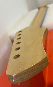 Click image for larger version. 

Name:	Headstock 6 coats.JPG 
Views:	455 
Size:	26.4 KB 
ID:	43384