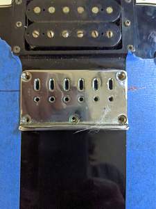 Click image for larger version. 

Name:	Peavey Gtr Bridge_Original Position_resized.jpg 
Views:	563 
Size:	168.5 KB 
ID:	43397