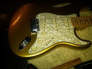 Click image for larger version. 

Name:	Gold Strat 2.jpg 
Views:	294 
Size:	79.8 KB 
ID:	8453