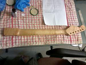 Click image for larger version. 

Name:	Strat Neck 4 Coats Of Stain_resized.jpg 
Views:	234 
Size:	213.3 KB 
ID:	9420