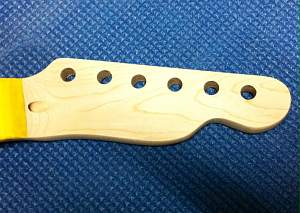 Click image for larger version. 

Name:	photo 1 Shaped front of headstock.JPG 
Views:	384 
Size:	481.8 KB 
ID:	9751